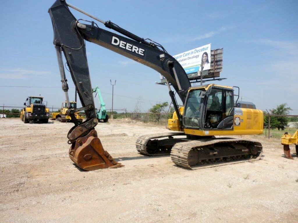 Used Deere 210G Excavator left front view