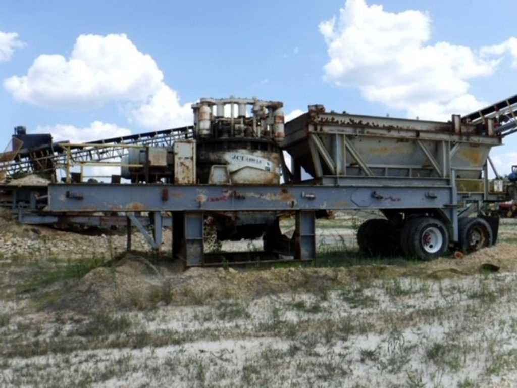 2002 KPI-JCI 1400 LS 54 inch used clone crusher side view.